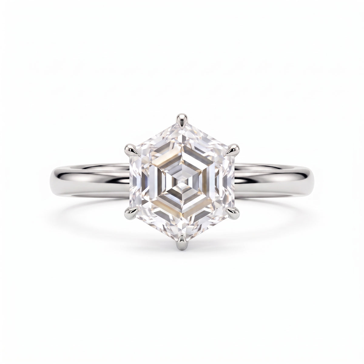 Hexagon step-cut lab-grown diamond solitaire engagement ring with a six-prong setting and polished yellow-gold band.