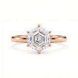 Hexagon step-cut lab-grown diamond solitaire engagement ring with a six-prong setting and polished yellow-gold band.