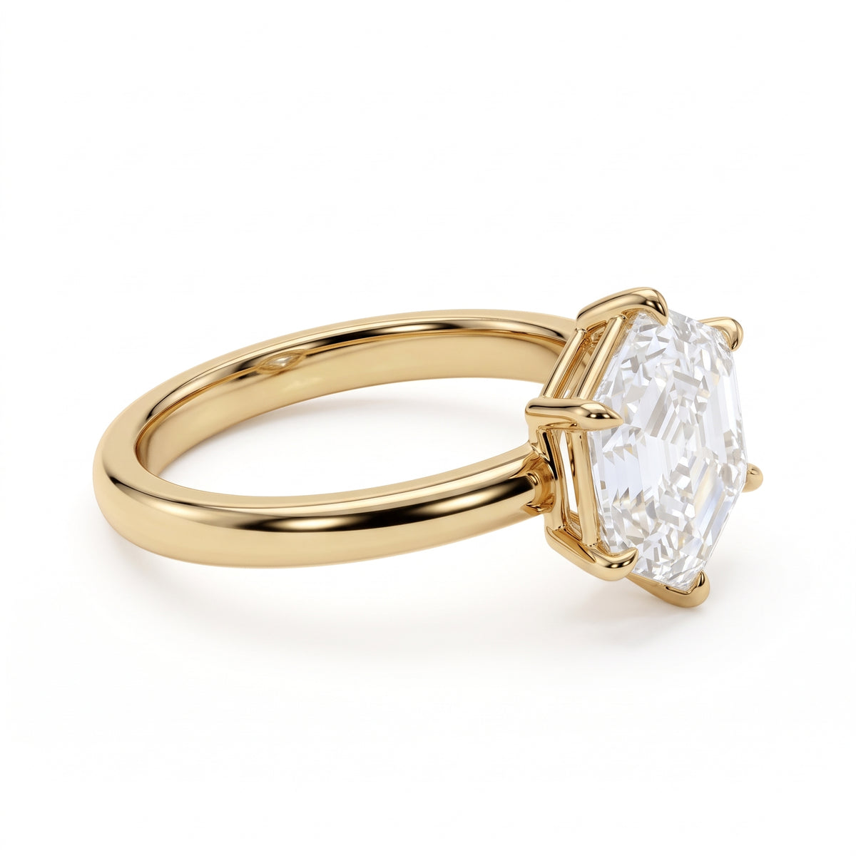 Hexagon step-cut lab-grown diamond solitaire engagement ring with a six-prong setting and polished yellow-gold band.