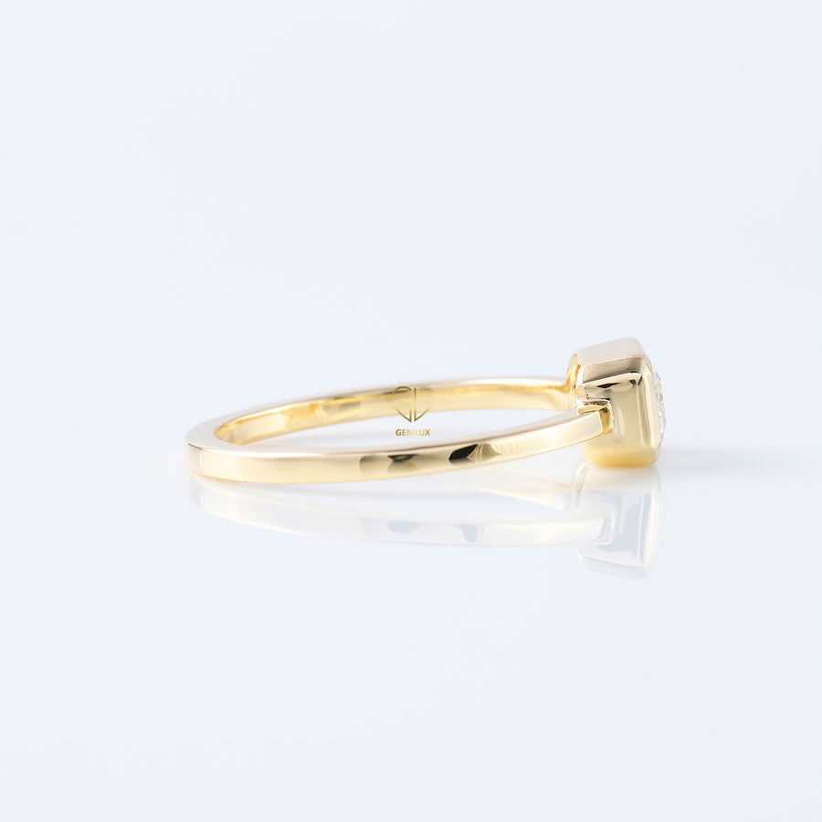 East to West Emarald Cut Moissanite Bezel Set Solitaire Ring