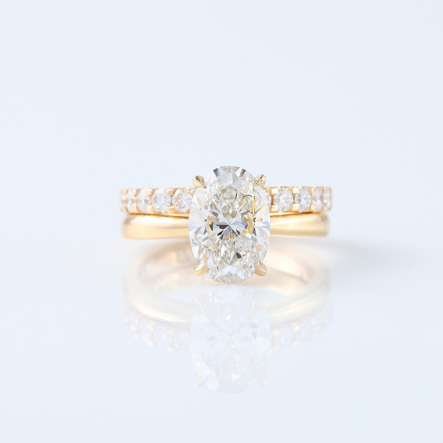 Oval Cut Moissanite Solitaire Ring With Matching Eternity Ring Set 