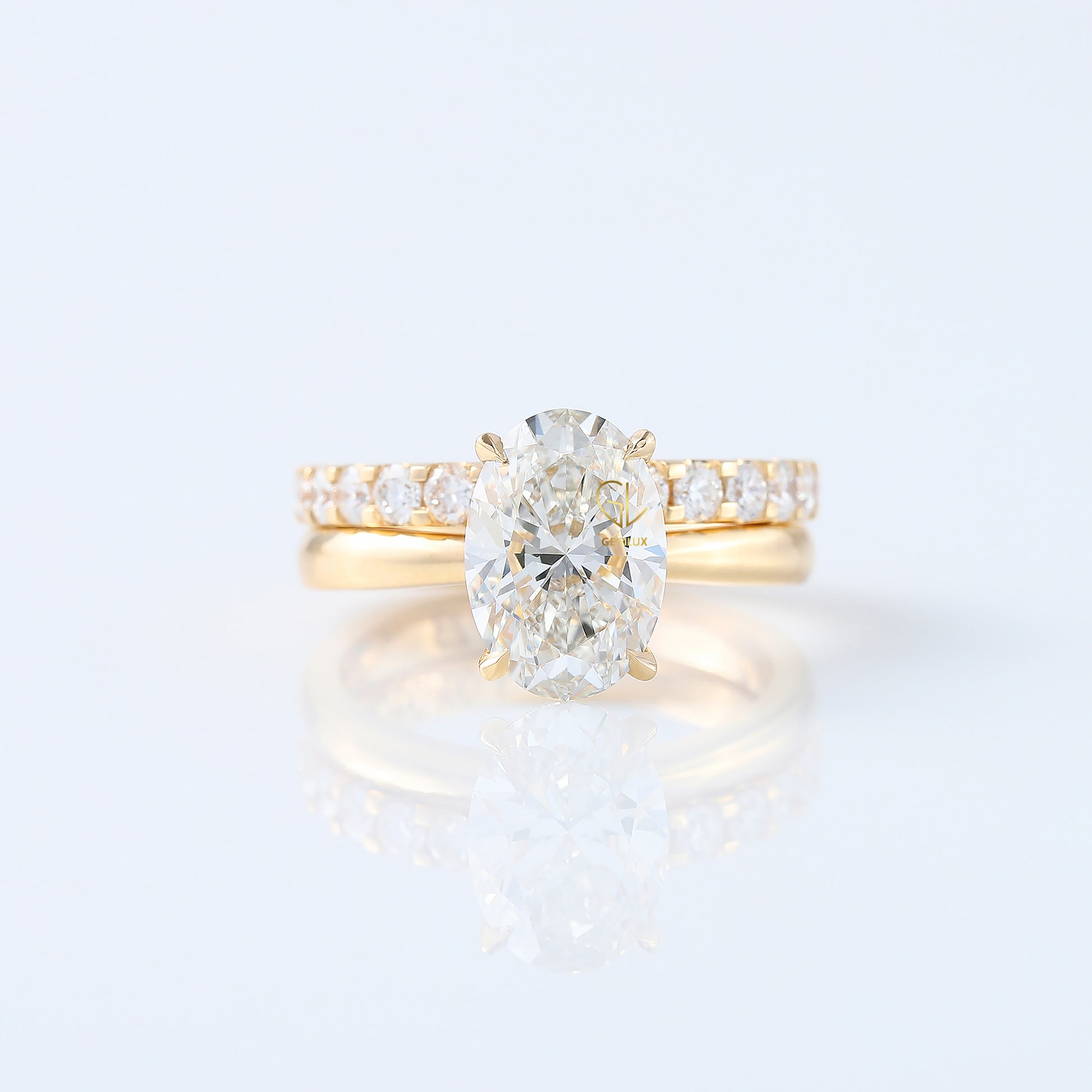 Oval Cut Moissanite Solitaire Ring With Matching Eternity Ring Set 