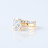 Oval Cut Moissanite Solitaire Ring With Matching Eternity Ring Set 