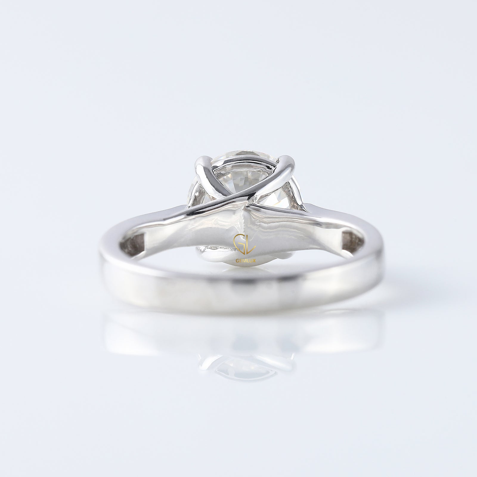 Pinch Style Round Moissanite Solitaire Engagement Ring