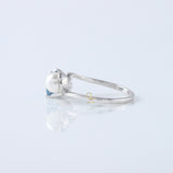 Blue Round Cut Lab Grown Diamond Swirl Bypass Engagement Ring