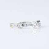 Bubble Style Three Stone Round Moissanite Bezel Set Eternity Band