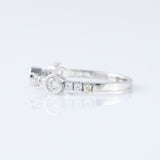 Bubble Style Three Stone Round Moissanite Bezel Set Eternity Band