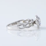 Twisted Round Moissanite Halo Infinity Shank Engagement Ring