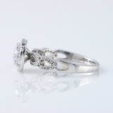 Twisted Round Moissanite Halo Infinity Shank Engagement Ring