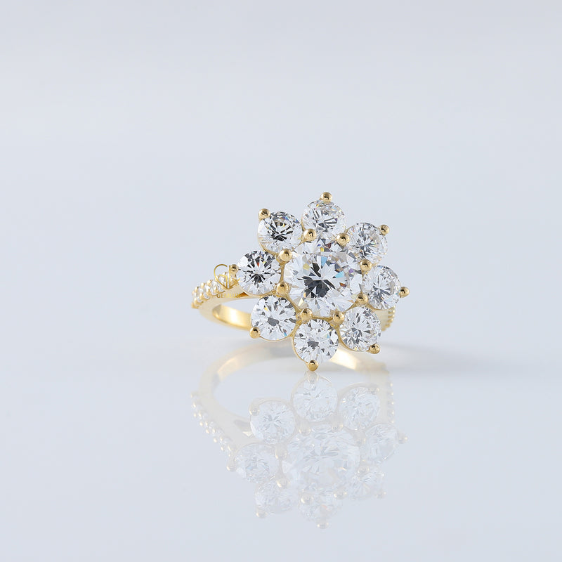 Round Moissanite Floral Engagement Ring In Yellow Gold
