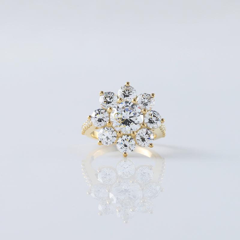 Round Moissanite Floral Engagement Ring In Yellow Gold