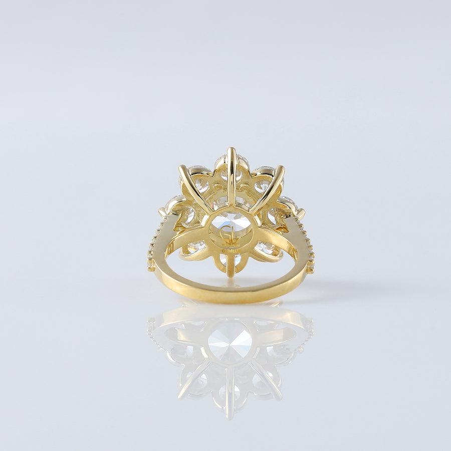 Round Moissanite Floral Engagement Ring In Yellow Gold