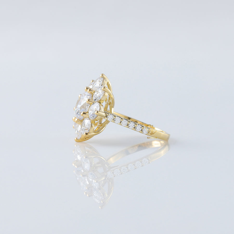 Round Moissanite Floral Engagement Ring In Yellow Gold