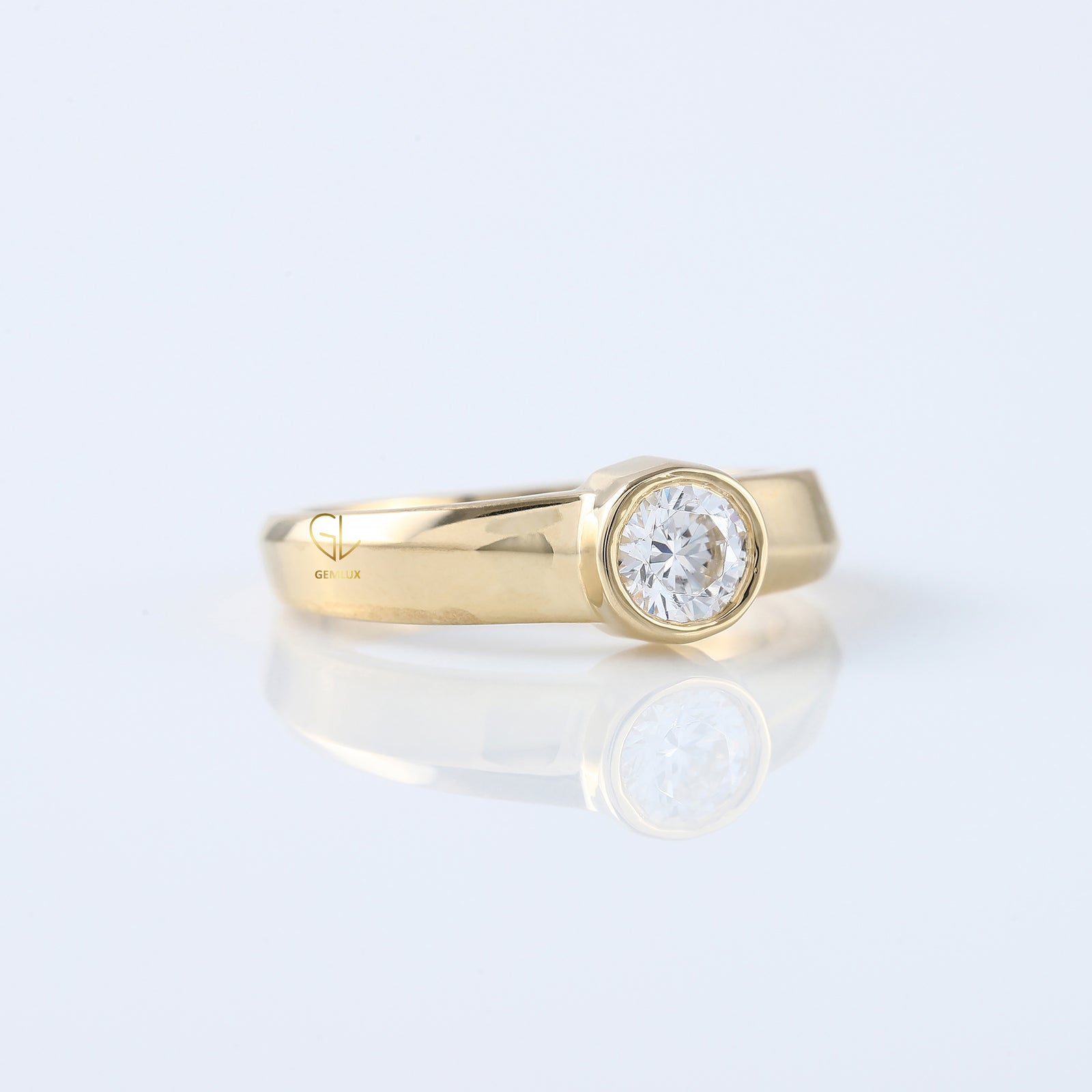 Bezel Set Round Moissanite Solitaire Yellow Gold Ring