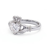 Heart-cut moissanite Irish Claddagh engagement ring with sculpted hands and crown in yellow gold