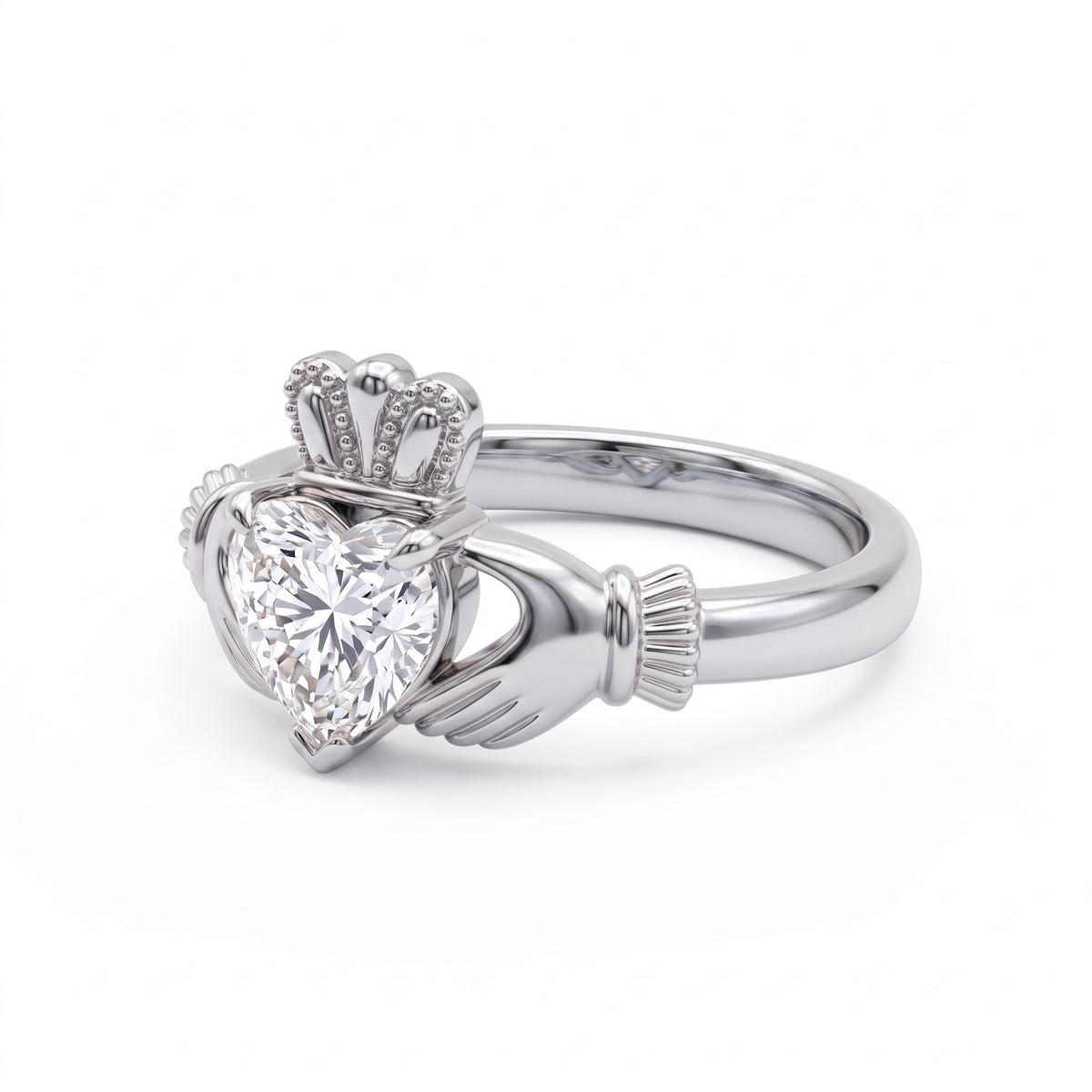 Heart-cut moissanite Irish Claddagh engagement ring with sculpted hands and crown in yellow gold