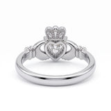 Heart-cut moissanite Irish Claddagh engagement ring with sculpted hands and crown in yellow gold