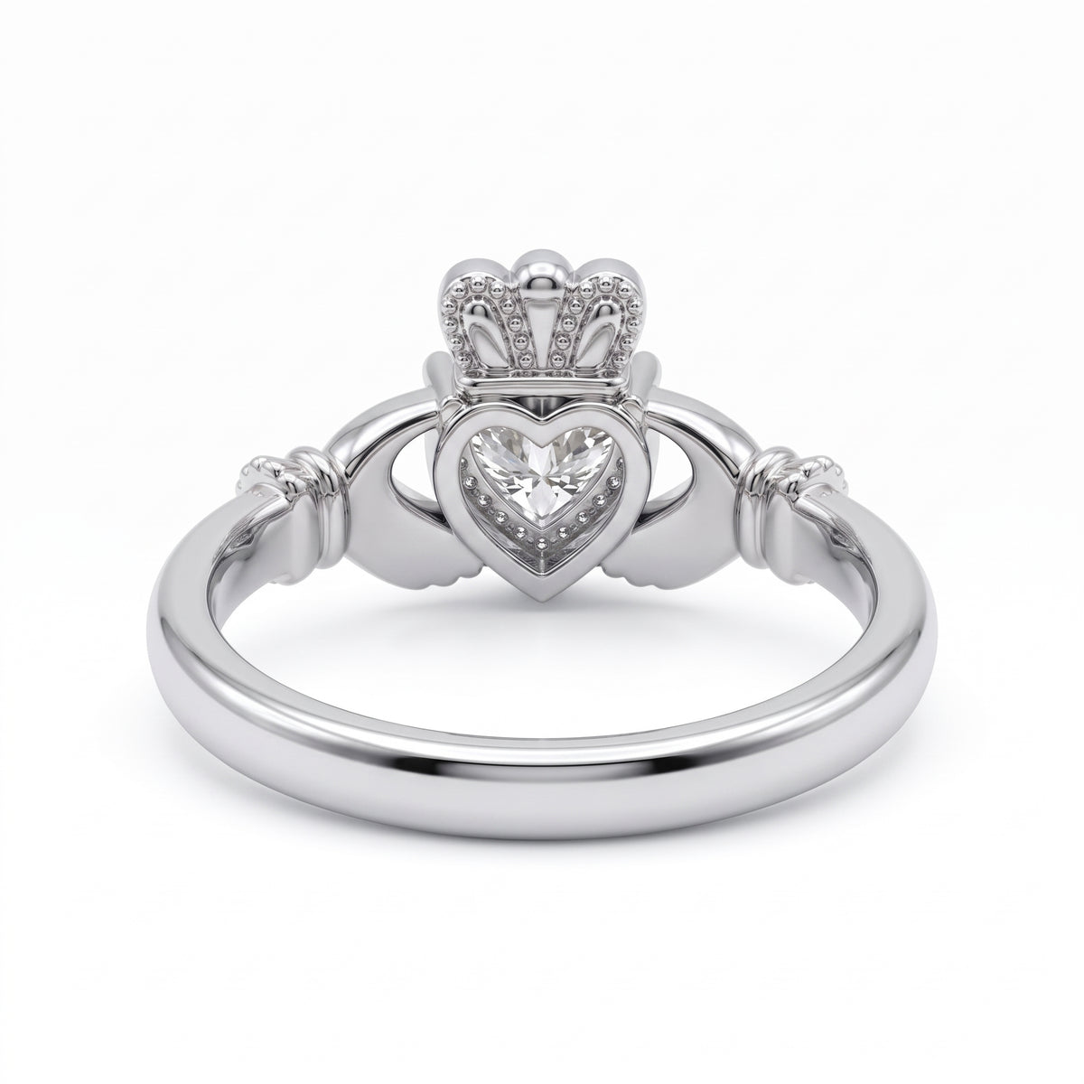 Heart-cut moissanite Irish Claddagh engagement ring with sculpted hands and crown in yellow gold