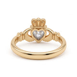 Heart-cut moissanite Irish Claddagh engagement ring with sculpted hands and crown in yellow gold