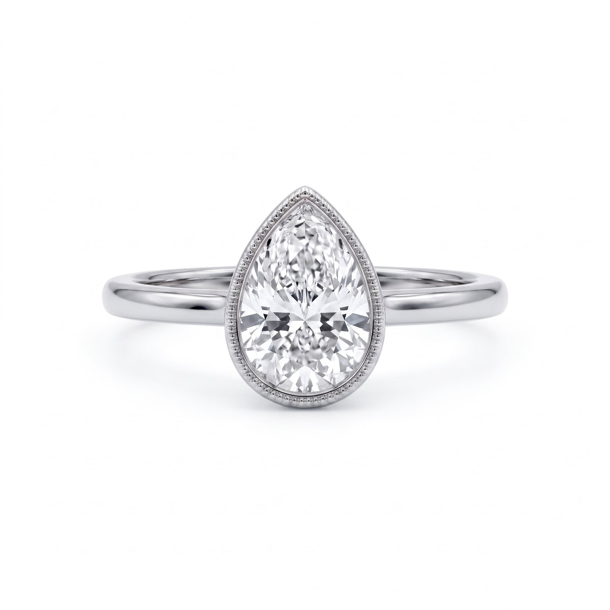 Pear-cut lab-grown diamond bezel solitaire engagement ring with fine milgrain detailing and a polished yellow-gold band.