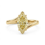 Markey ring with fancy yellow marquise lab grown diamond and bypass yellow gold band