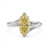 Markey ring with fancy yellow marquise lab grown diamond and bypass yellow gold band