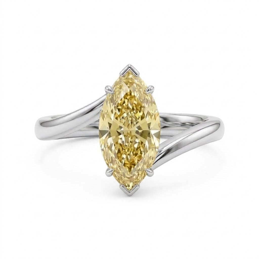 Markey ring with fancy yellow marquise lab grown diamond and bypass yellow gold band