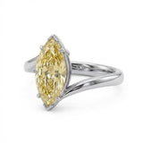 Markey ring with fancy yellow marquise lab grown diamond and bypass yellow gold band