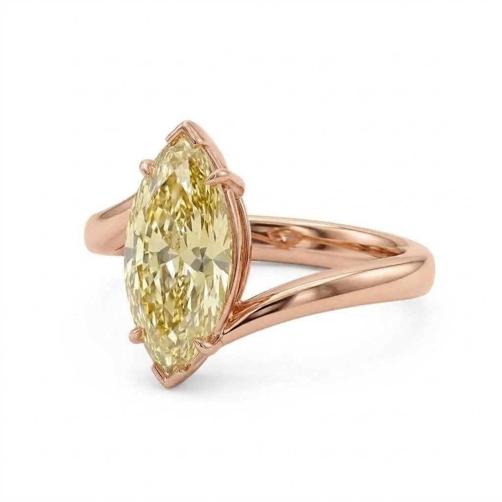Markey ring with fancy yellow marquise lab grown diamond and bypass yellow gold band
