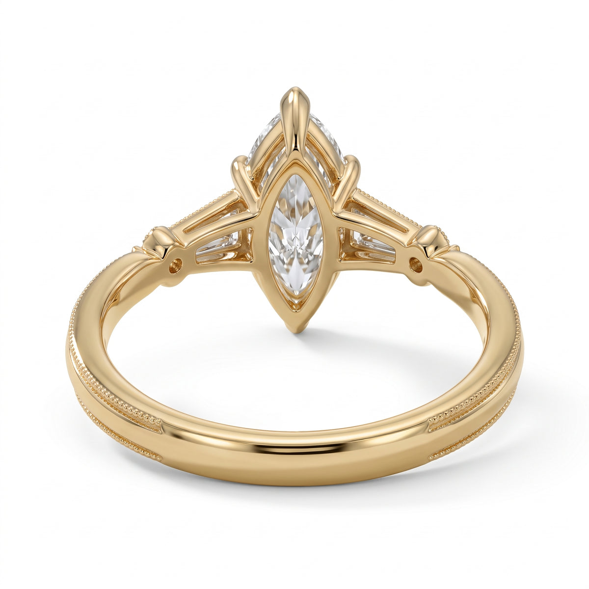 Marquise-cut lab-grown diamond engagement ring with tapered baguette side stones, round accents and a milgrain split-shank yellow-gold band.