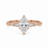 Marquise-cut lab-grown diamond engagement ring with tapered baguette side stones, round accents and a milgrain split-shank yellow-gold band.