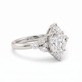 Marquise lab grown diamond engagement ring with marquise and round diamond cluster side stones