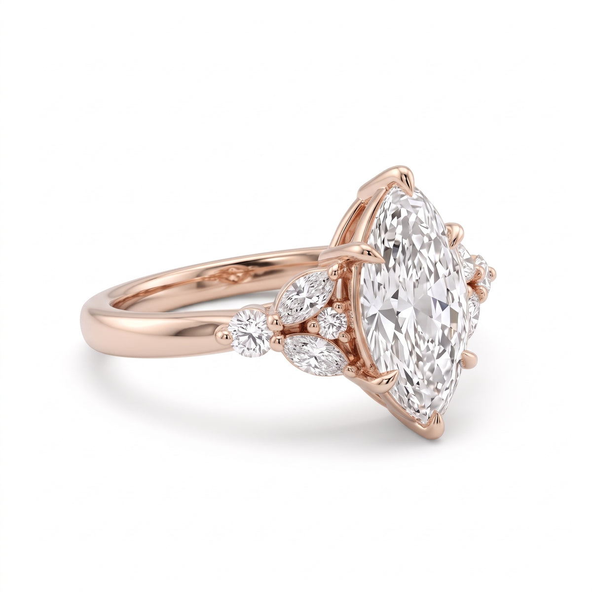 Marquise lab grown diamond engagement ring with marquise and round diamond cluster side stones