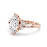 Marquise lab grown diamond engagement ring with marquise and round diamond cluster side stones
