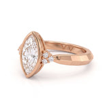 Bezel set marquise lab grown diamond engagement ring with round cluster side stones in white gold