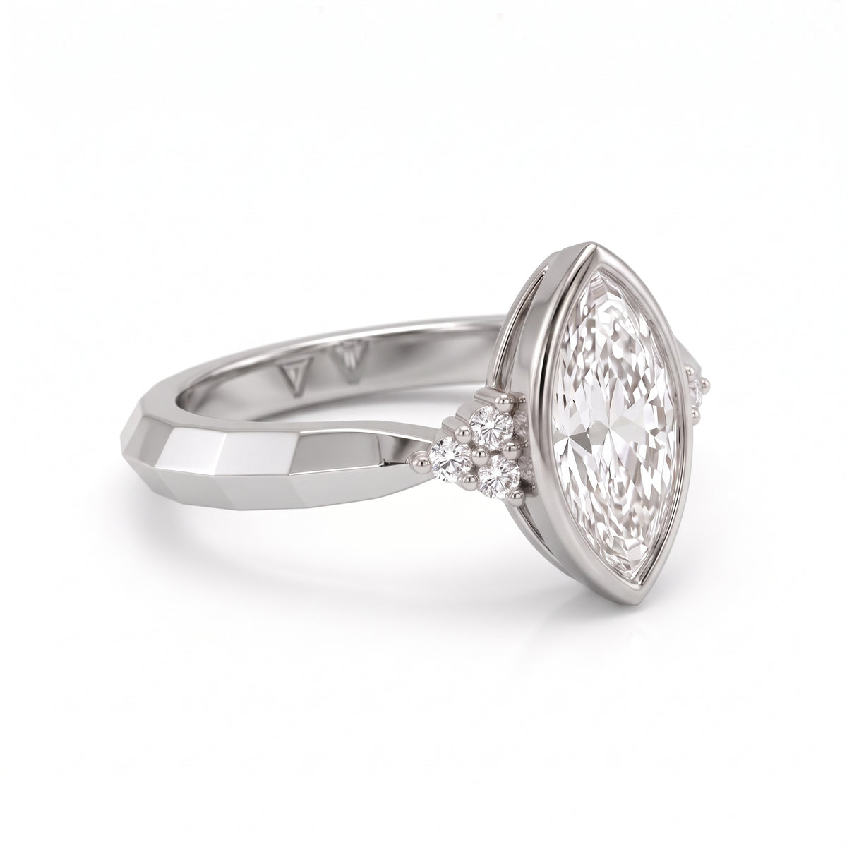 Bezel set marquise lab grown diamond engagement ring with round cluster side stones in white gold
