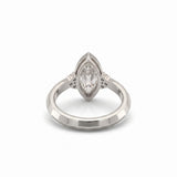 Bezel set marquise lab grown diamond engagement ring with round cluster side stones in white gold