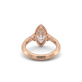 Bezel set marquise lab grown diamond engagement ring with round cluster side stones in white gold