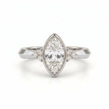 Bezel set marquise lab grown diamond engagement ring with round cluster side stones in white gold