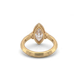 Bezel set marquise lab grown diamond engagement ring with round cluster side stones in white gold