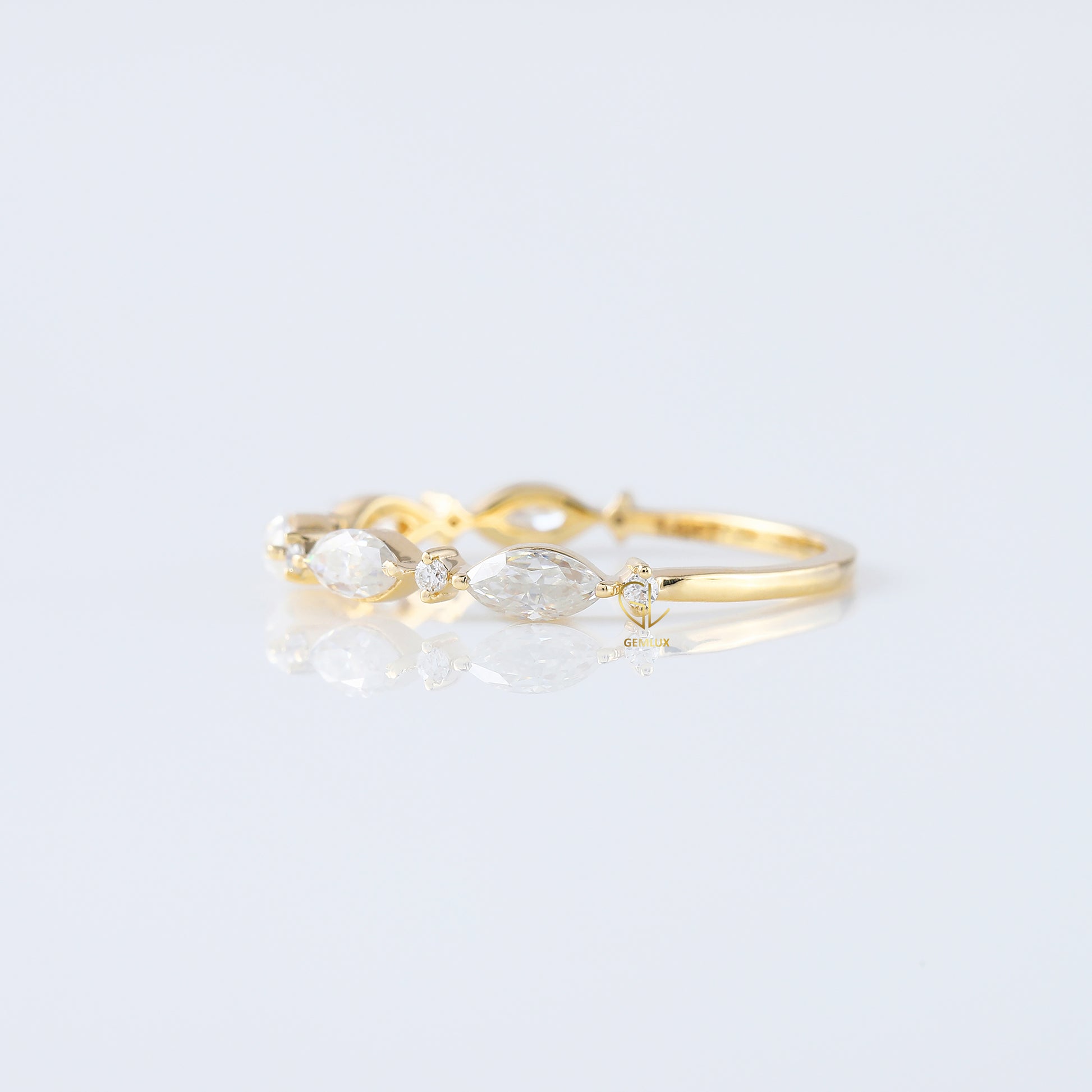minimalist band, alternative stone eternity band, marquise and round moissanite matching band, yellow gold eternity wedding band; 
