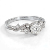 Vintage three-stone round lab-grown diamond ring with leaf-design yellow-gold band