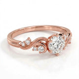 Vintage three-stone round lab-grown diamond ring with leaf-design yellow-gold band