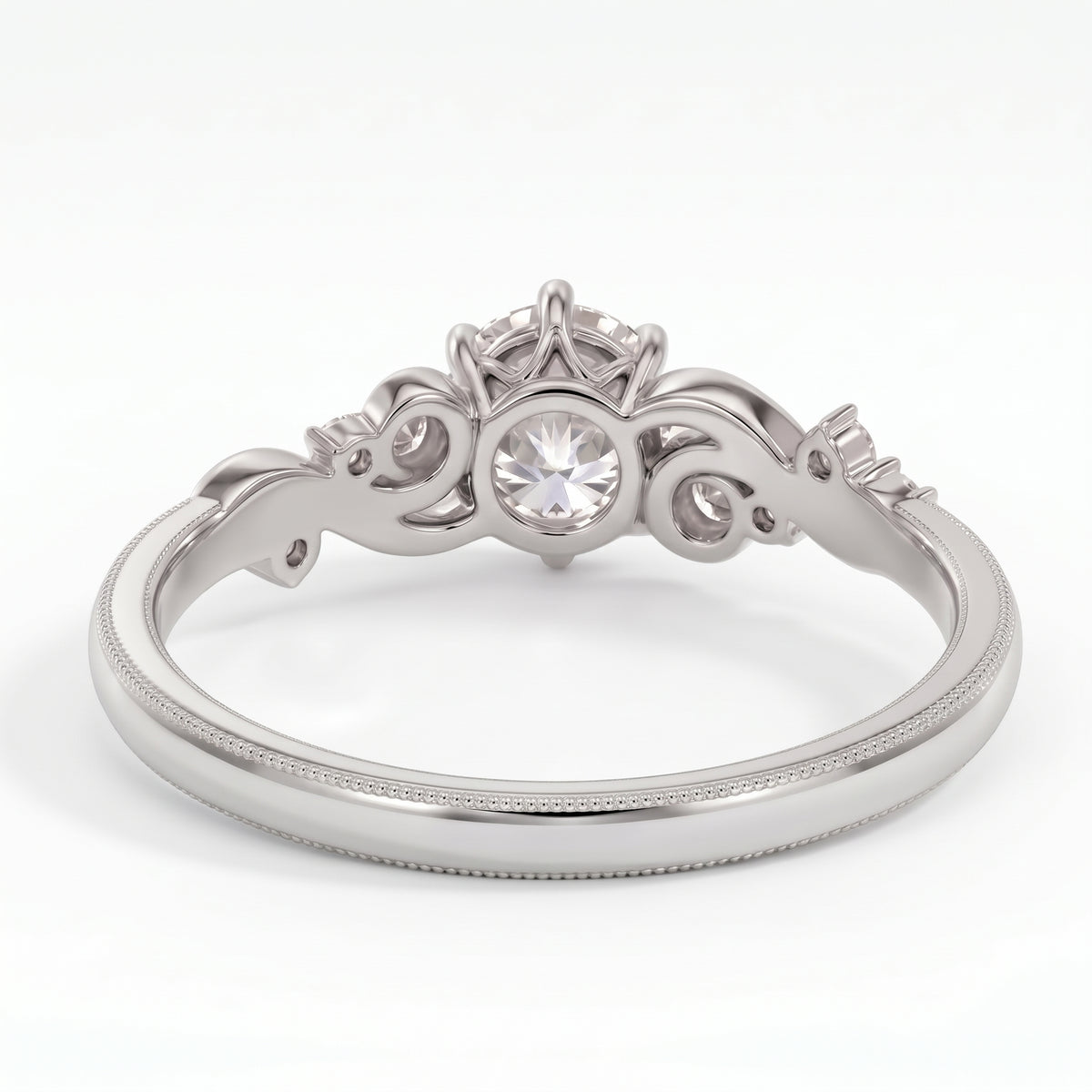 Vintage three-stone round lab-grown diamond ring with leaf-design yellow-gold band