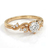 Vintage three-stone round lab-grown diamond ring with leaf-design yellow-gold band