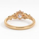 Vintage three-stone round lab-grown diamond ring with leaf-design yellow-gold band