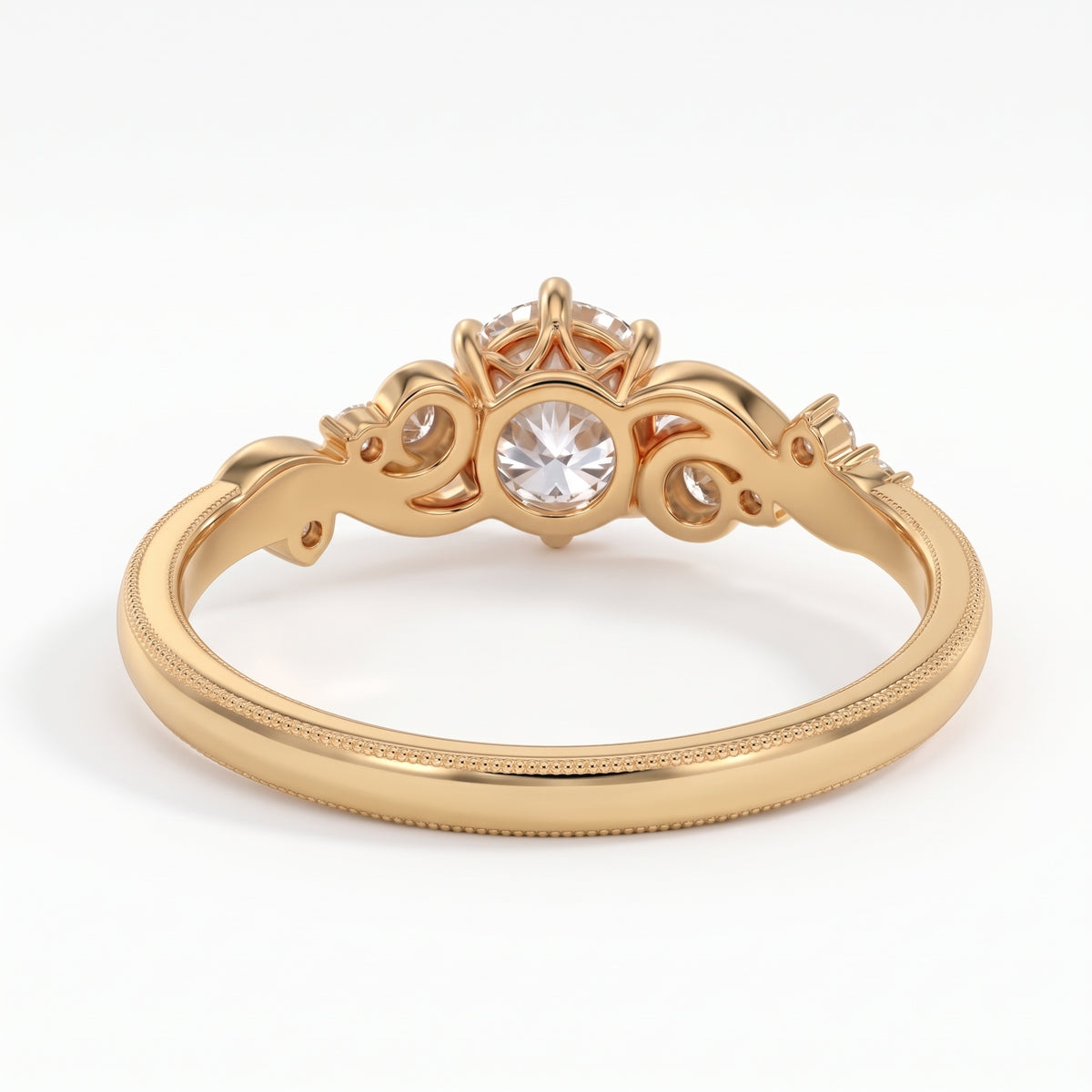 Vintage three-stone round lab-grown diamond ring with leaf-design yellow-gold band