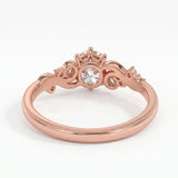 Vintage three-stone round lab-grown diamond ring with leaf-design yellow-gold band