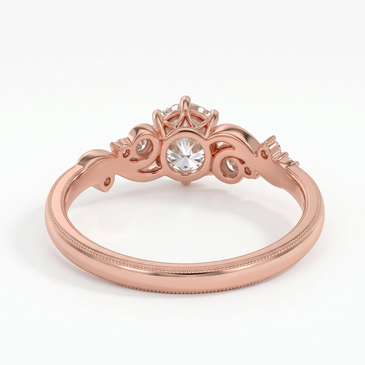 Vintage three-stone round lab-grown diamond ring with leaf-design yellow-gold band