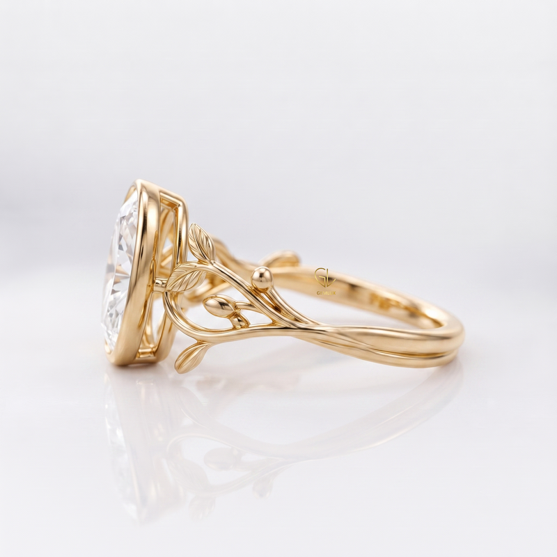 Moval Cut Lab-Grown Diamond Bezel Set Botanical Vine Engagement Ring